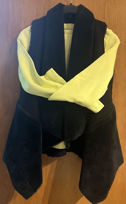 Vesta blana artificiala