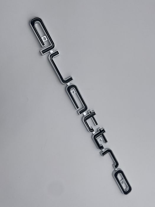 Emblema Audi Quattro grila crom negru