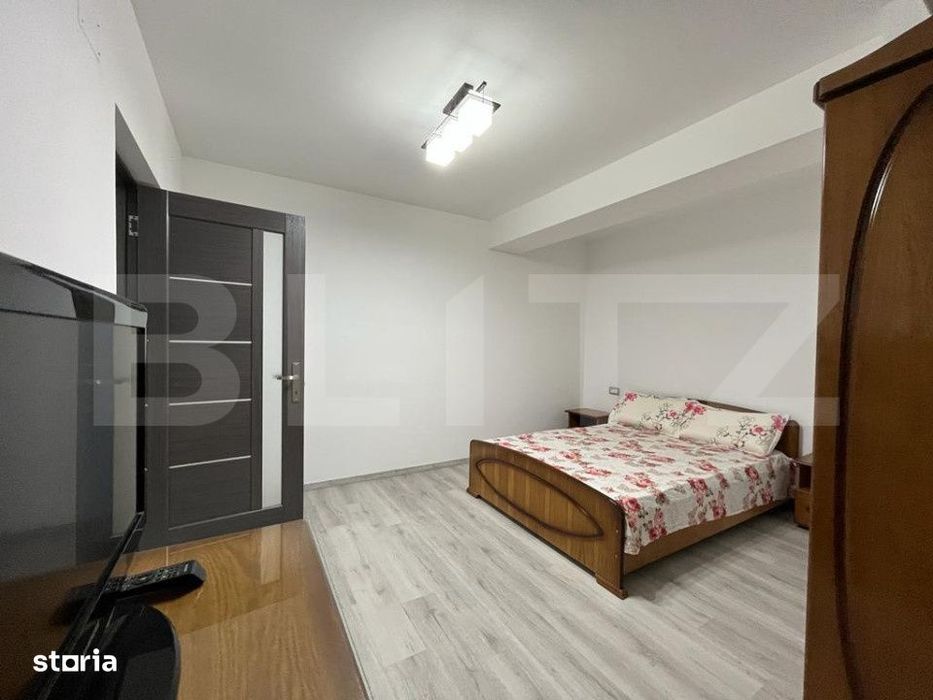 Apartament modern cu doua camere, centrala si loc de parcare privat