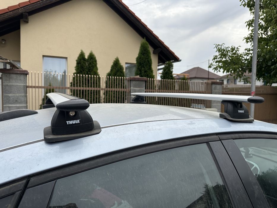 Set bare Thule pentru Opel Astra J sedan
