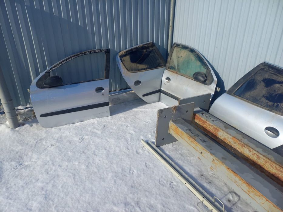 Двери на машину Пежо 206