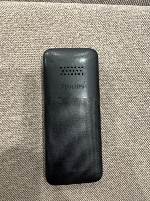 Продам моб.телефон Philips E106