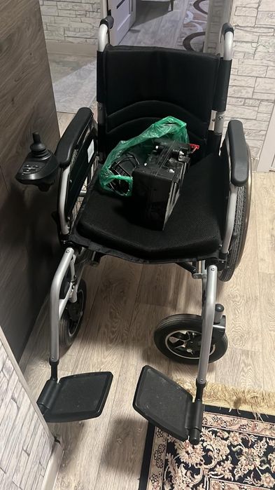 Электрическая инвалидная коляска