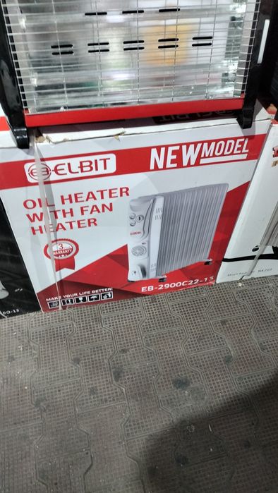 Масляный радиатор обогреватель qovurgali moyli pechka