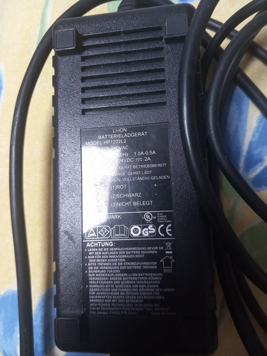Vând încărcător  bicicleta electrica