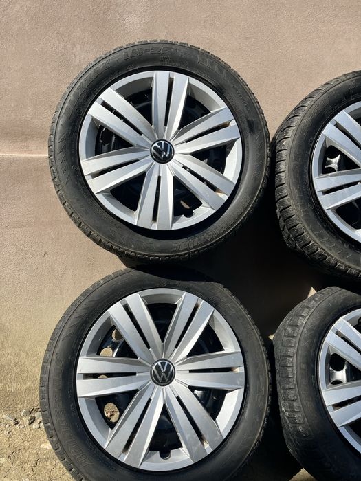 Set 4 jante tablă VW Golf 5 R16 + anvelope 205/55 R16 + 2 seturi capace VW