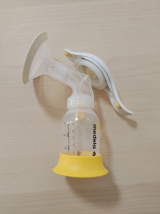Електрическа помпа Medela swing flex + ръчна помпа Medela