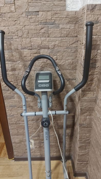 Продам элептический тренажер