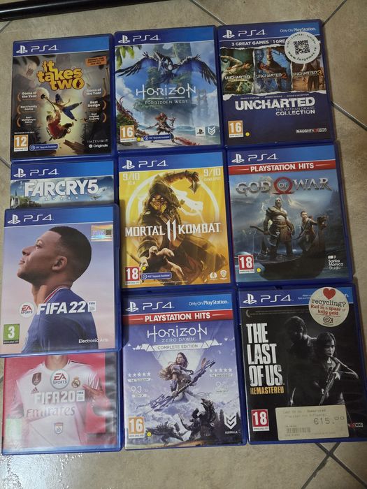 PS4  Pro 1TB + 2 manete + jocuri + suport încărcare