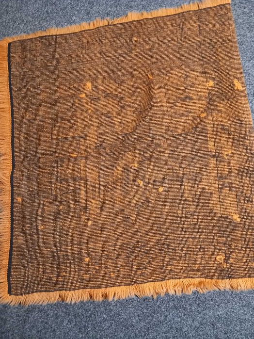 Малко вълнено килимче