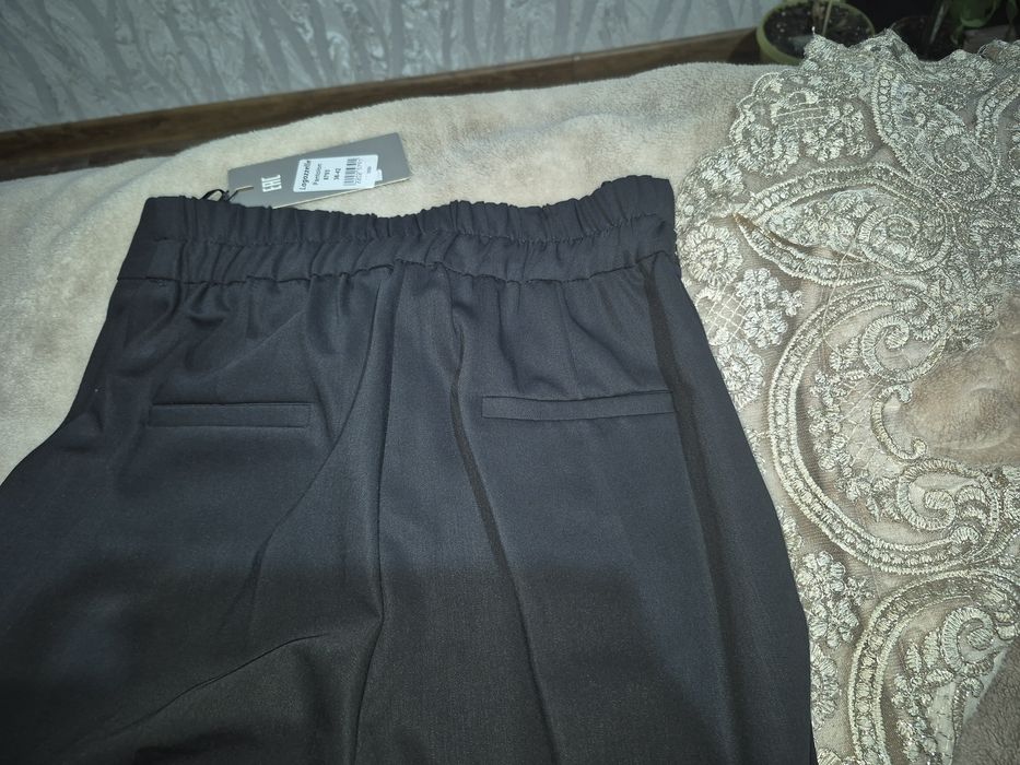Продам брюки новые