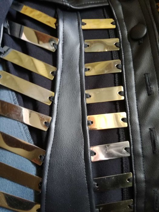 Връхна дреха тип жилетка