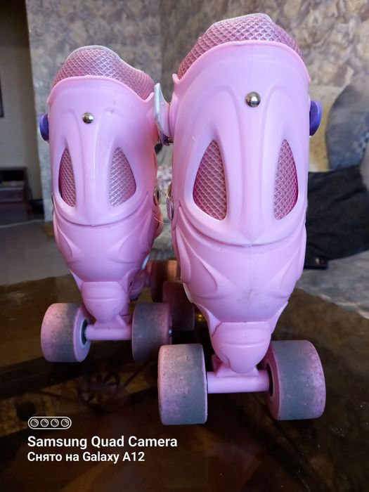 Роликовые коньки