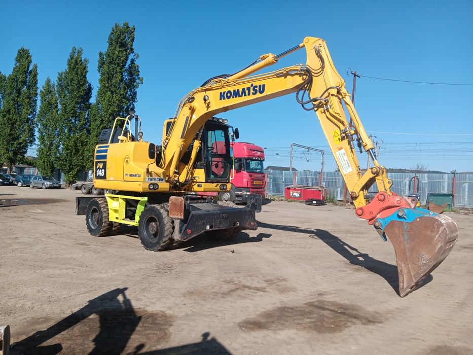 Vând sau schimb excavator komatsu PW 148