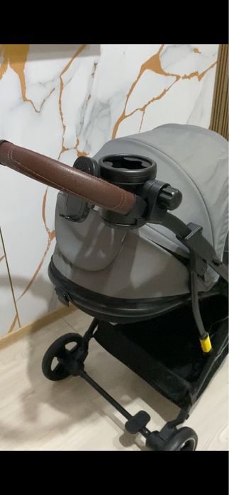 Коляска с маневренными колесами