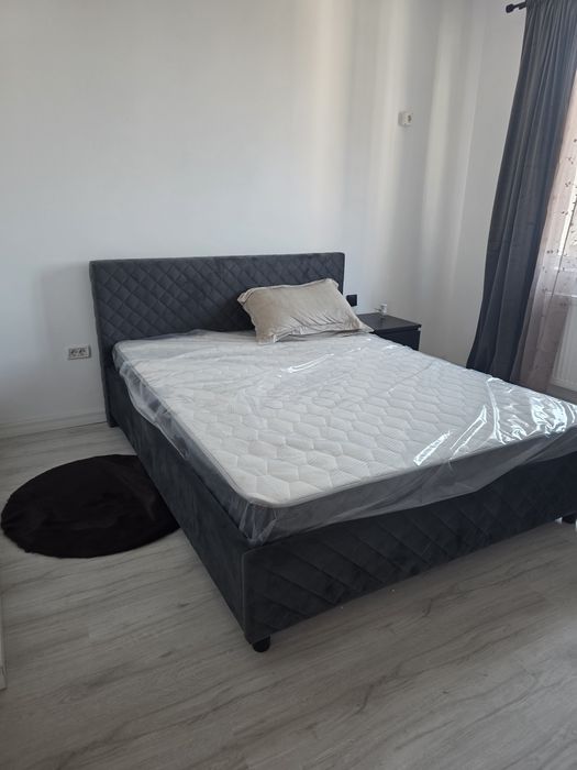 Închiriez garsoniera + loc parcare