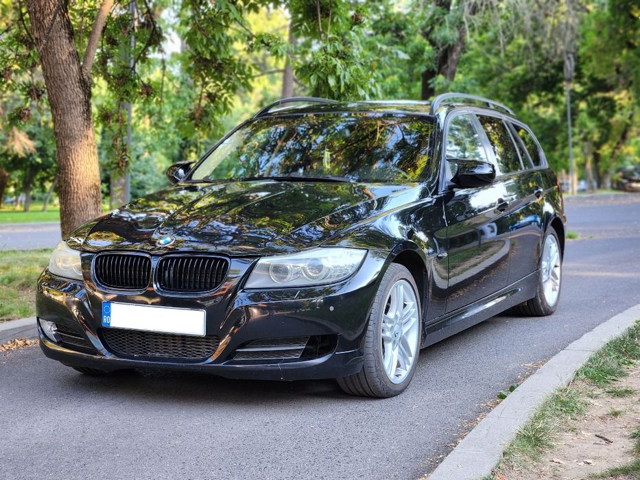 BMW 318d Touring • 2.0 Diesel 143 CP • Xenon Adaptive • Navi Mare • Încălzire Scaune