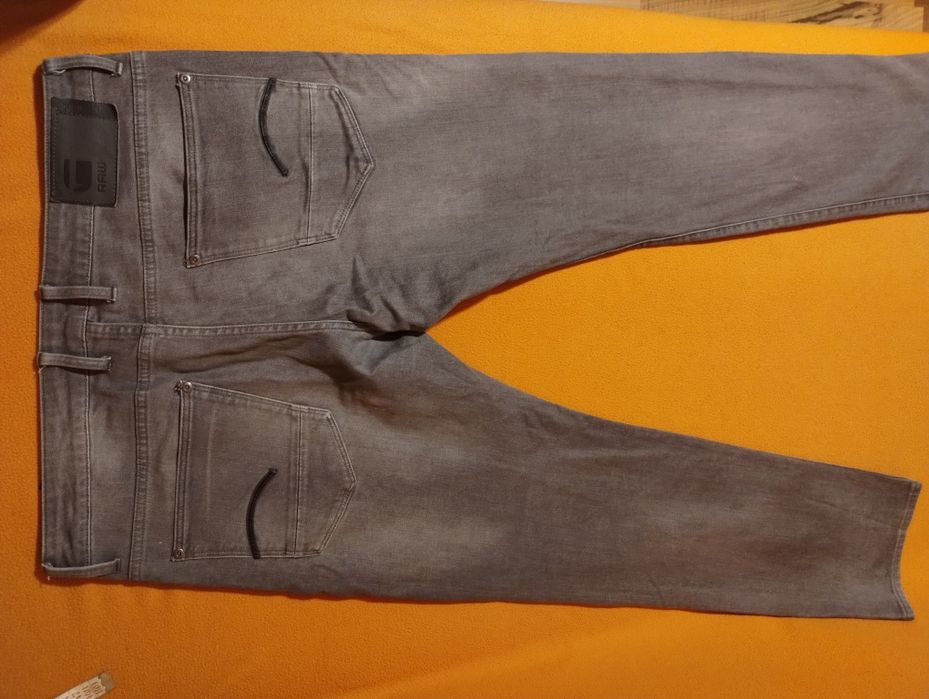 Blugi Wrangler si G Star