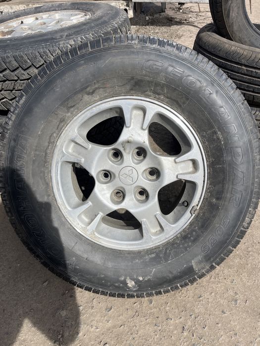Диски с резиной на митцубиси паджеро 3 поколения на R16 245/75
