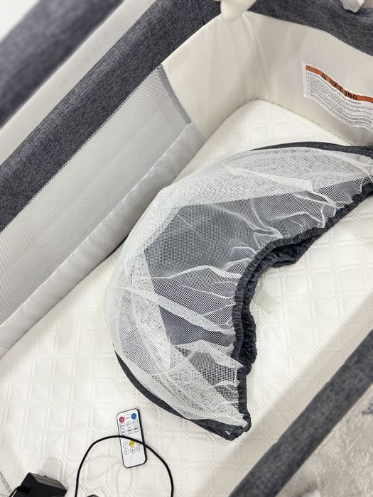 Электронная кроватка манеж