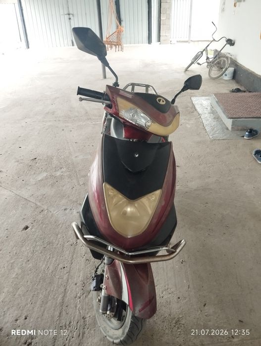 Скутер 125 кубов