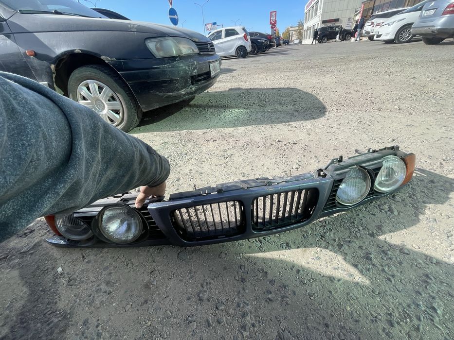 Запчасти бмв е34 решетка фары
