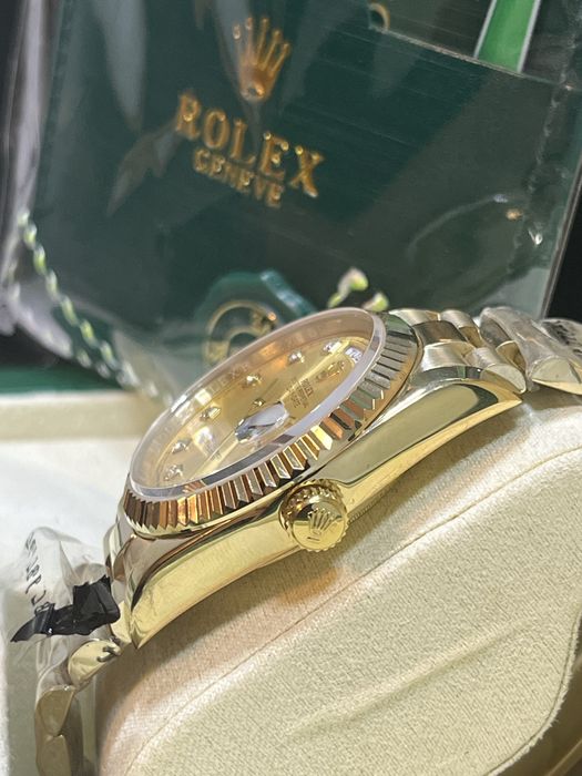 Rolex Day-Date gold 36mm si 41 mm