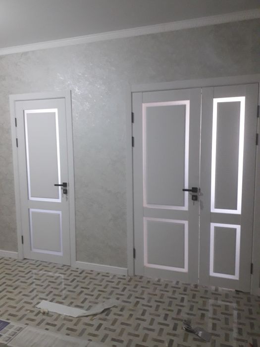 Установка межкомнатных и входных дверей.