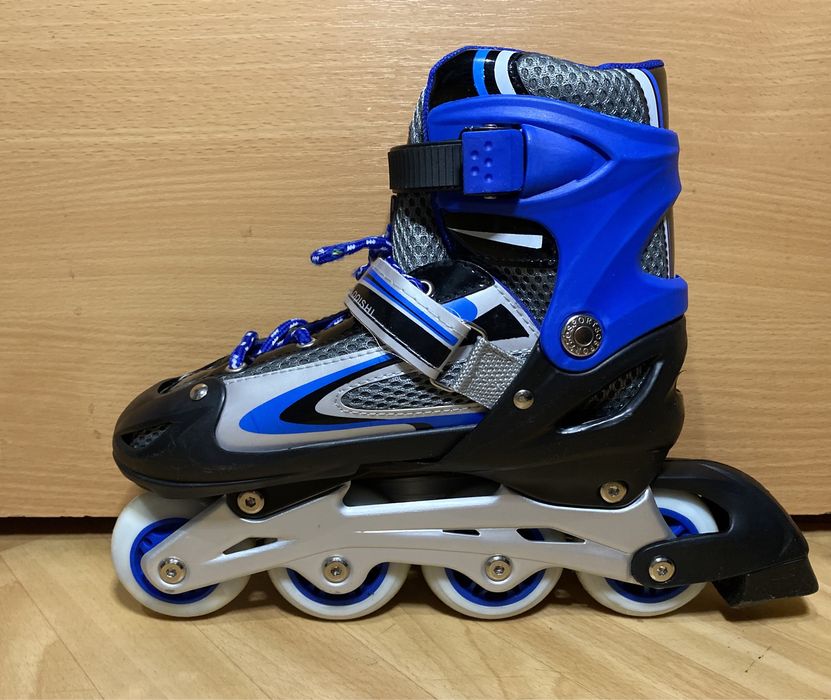 Роликовые коньки