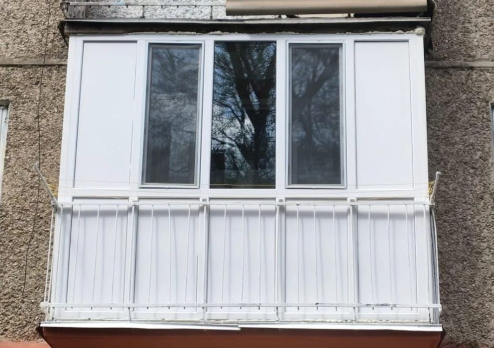 Балконы окна двери