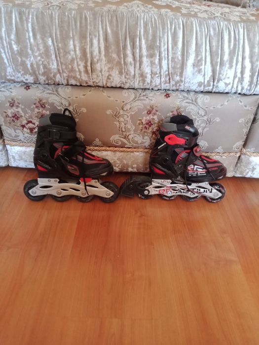 Роликовые коньки