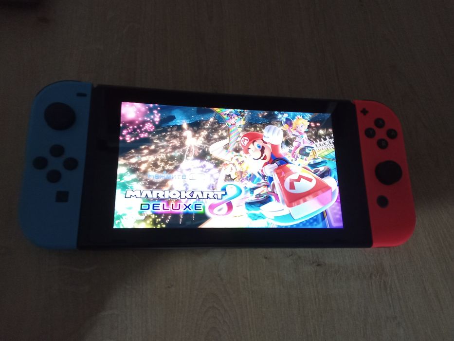 Nintendo switch 1 și jocuri mk11 mario cart deluxe și fifa23 (cluj)
