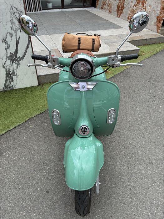 Scuter electric nou,  still Vespa clasic
