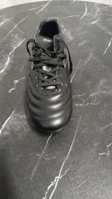 Ghete de fotbal Joma și New Balance