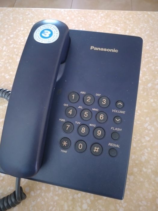 Стационарный телефон Panasonic. Рядом с Каргу.
