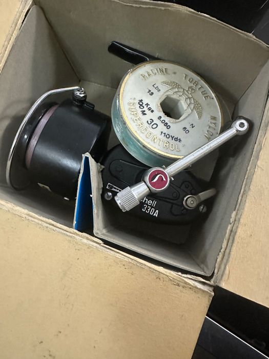 1957 Garcia Mitchell spinning reel 330А.
