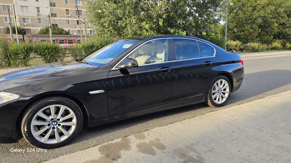 BMW 5 Series 2011 — imagine 29