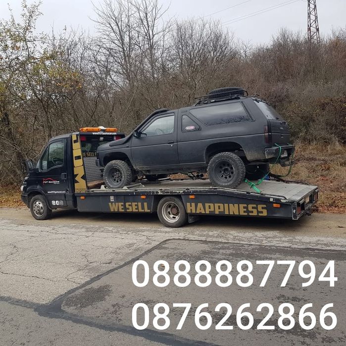 Пътна помощ, самосвал с кран.