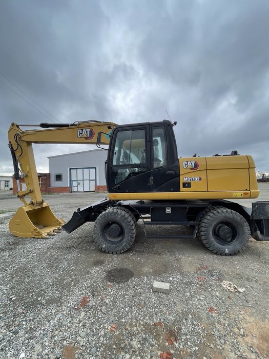 Услуги Колесного экскаватора