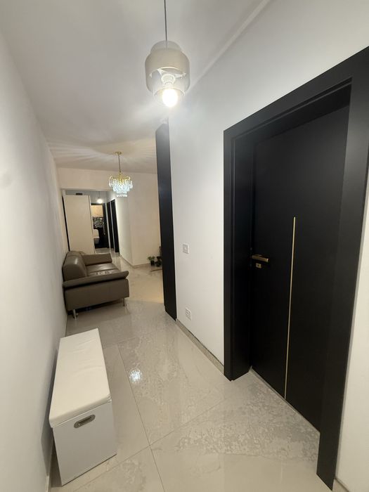Inchiriez apartament trei camere LUX  Prima  WISTA CU LOC PARCARE CU PRIZA  INCARCARE MASINA