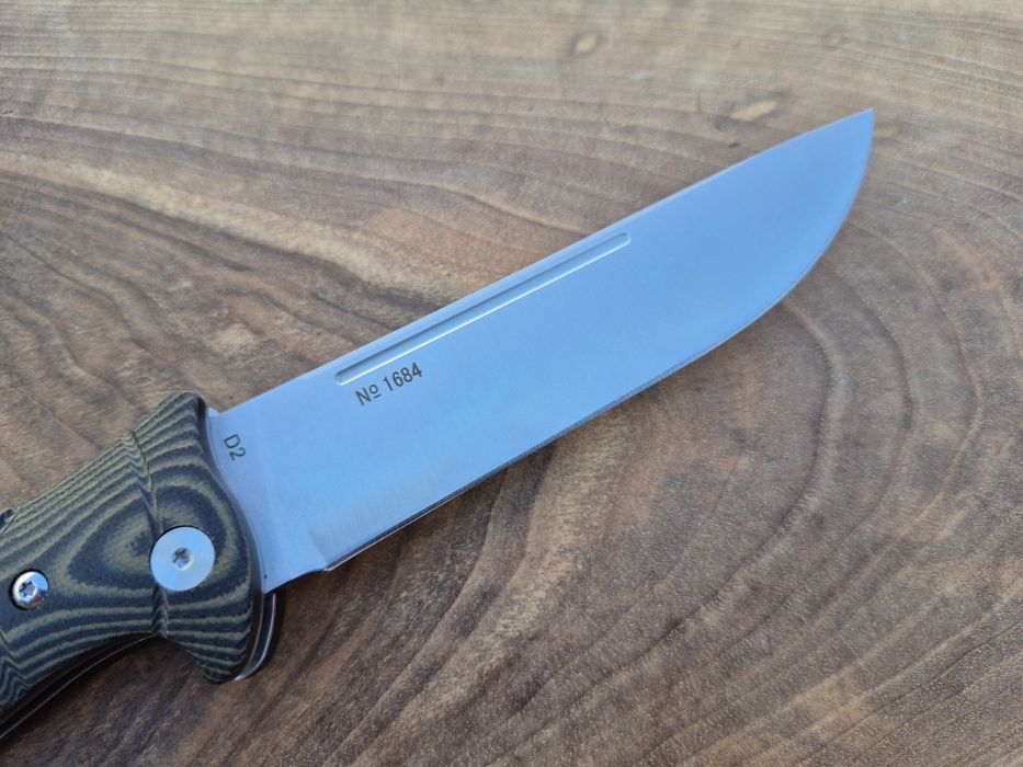 Руски сгъваем нож REPTILIAN,стомана D2,No1684

Описание:

• обща дъл