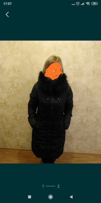 Женский пуховик .