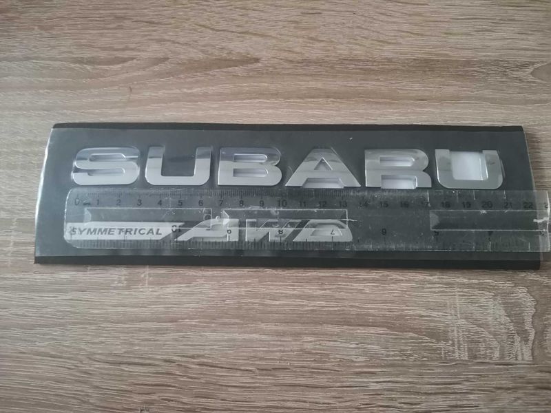 комплект сребристи емблеми SUBARU и Symmetrical AWD