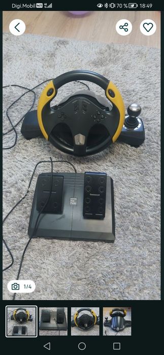 Volan gaming puțin folosit
