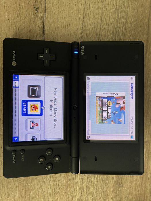 Nintendo dsi (modat) cu 2 jocuri si o carcasa