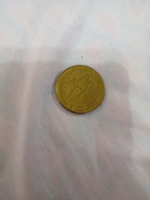 Монета с алимпийских игр