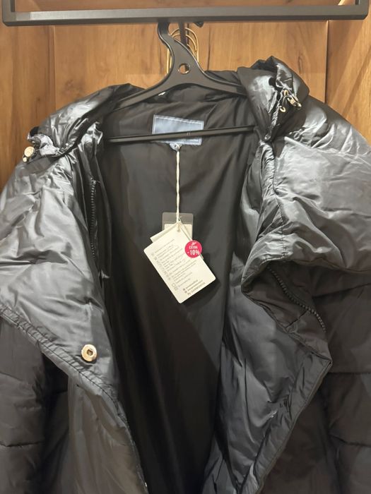 Продам пуховик зимний новый