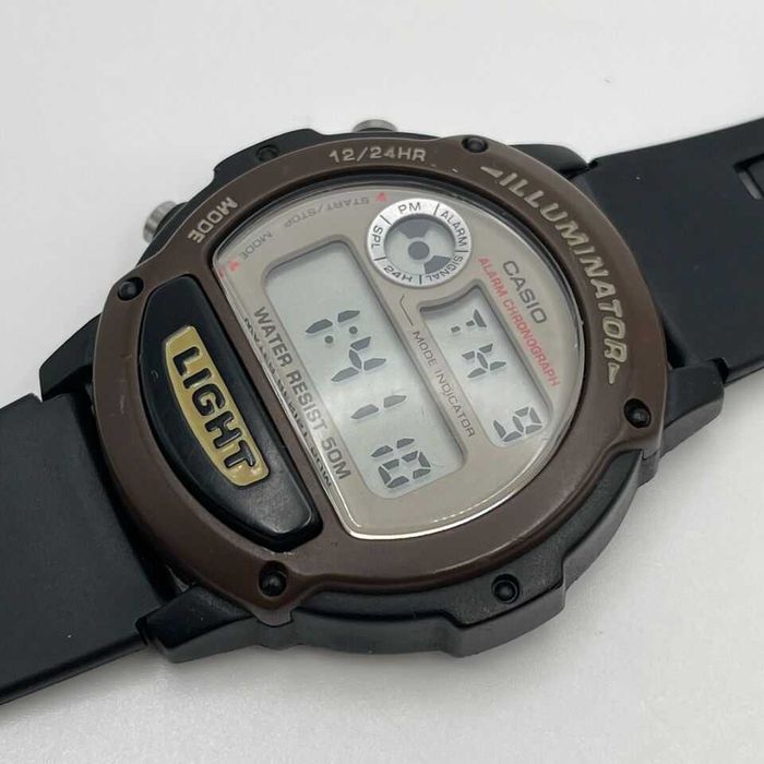 Ceas Casio Illuminator digital maro-negru, nou la cutie curea maro