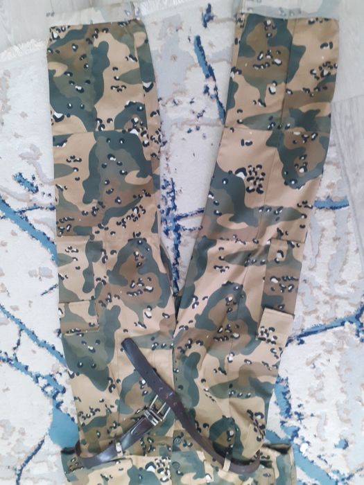 Камуфляж костюм новый.