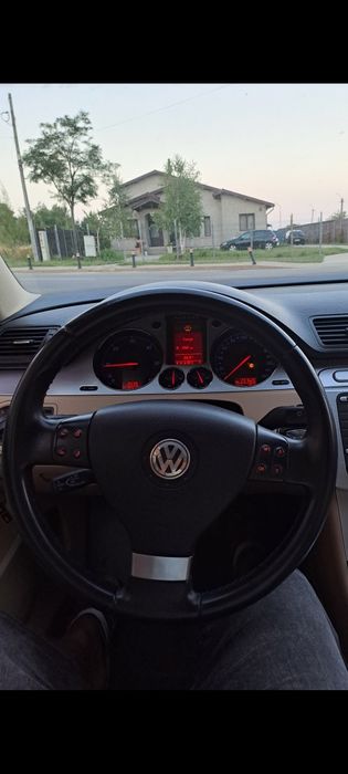 Volan piele 3 spite cu comenzi Volkswagen VW Passat B6 
Cu calculatoru